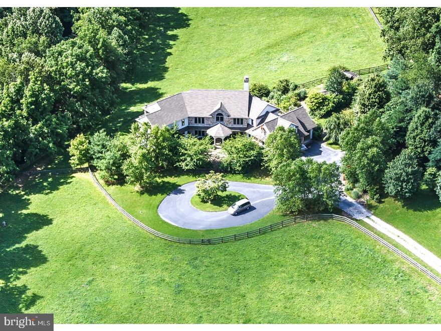 Combining a picturesque country setting in one of Chester County's most sought after corners with an amazing custom home featuring state-of-the-art amenities, this property has it all - a large, privately set 5 Bedroom, 4.2 Bath home boasting loads of high-end finishes, an indoor pool, a 6 stall barn, pond, 100' x 170' riding ring, 23  acres and all abutting township owned open space that is contiguous with the 1300 acre ChesLen Preserve. The spacious home features a wonderful open floor plan and plenty of glass to take advantage of the stunning views and southern exposure. The Main Level floors are  magnificent reclaimed wood and travertine. The fully finished Lower Level is complete with a large Indoor Pool, Game Area, second Kitchen and Exercise Room with a full Bath and Sauna.  The large office on the Main Level could easily become an In-law Suite. On the Upper Level, you will love the Japanese inspired Master Suite with Shoji Screens used as room dividers and doors. There are four additional Bedrooms including a suite of rooms that would be a great Au-Pair or In-law Suite.  For the horses, there is a large four stall Barn with Wash Stall, Feed Room and Tack Room, four good-sized pastures, a round pen and a large Riding Ring with exceptional footing. No expense was spared in the construction of this farm. Taxes were just reduced by $10,000 making this fantastic property much more affordable!! This beautifully landscaped property is located between Marshallton and Unionville in Radnor's Brandywine Hunt Country and in award-winning Unionville Chadds-Ford School District, within easy reach of West Chester, Kennett Square, Wilmington, the 202 corridor and trains to Philadelphia and New York.