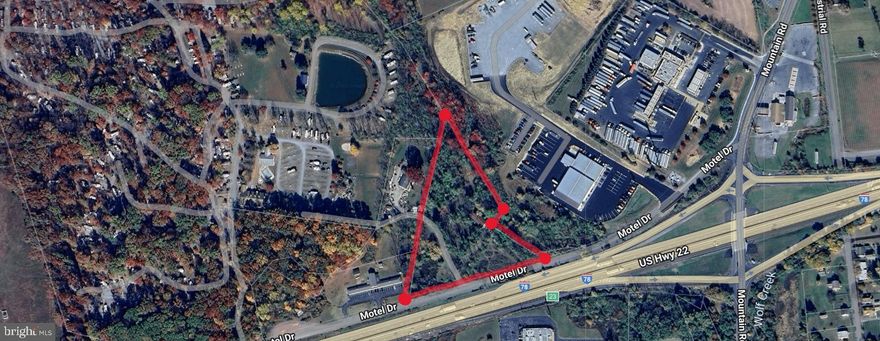 Prime highway commercial location in Shartlesville, Berks County PA.  Highest and best use is redevelopment for uses withing the HC zoning guidelines.  4.49 acres with over 700 feet of road frontage facing Rt. 78 with daily traffic count of over 33,000. Wide range of allowable uses -Public sewer line currently runs through the property.  Contact listing agent for specific zoning information.  Located nearby is Appalachian Campgrounds, Kenworth Trucks, Love's Truck Stop,  Dunkin', Amazon Warehouse