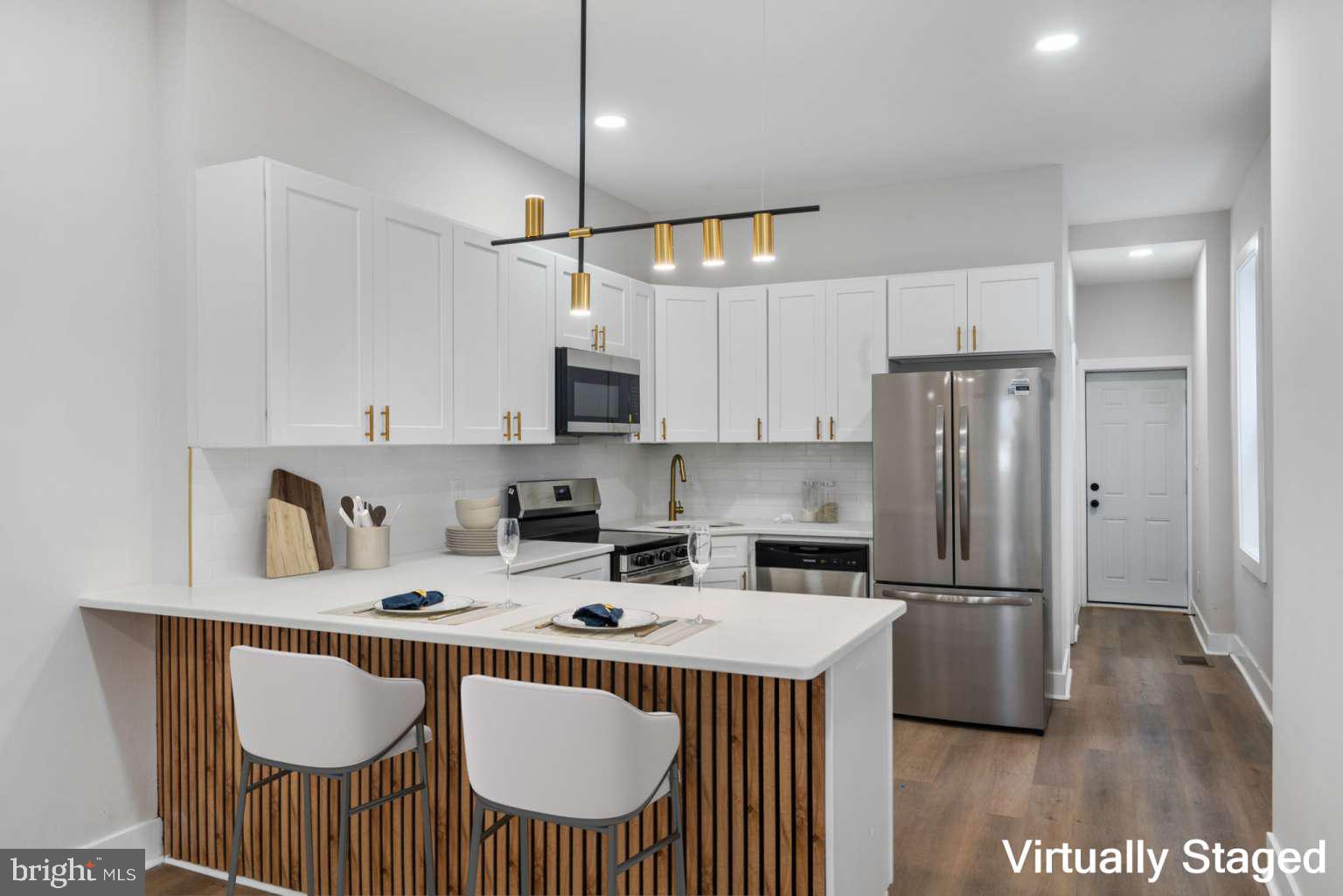 Your Family's Perfect Home Awaits! This beautifully renovated 4-bedroom, 2- full bathroom home offers a spacious 1,720 sqft layout designed with families in mind. Enjoy peace of mind with brand new systems throughout, including a high-efficiency HVAC system, energy-saving water heater, new roof, new plumbing, new electrical, and new windows—making this home both eco-friendly and budget-conscious.
Step inside to a warm and inviting living space with nearly 10-foot ceilings, creating an open and airy feel. The modern kitchen features white shaker cabinets, a peninsula island, and plenty of counter space—perfect for family meals and gatherings.
The first floor includes a convenient laundry room and a full bathroom, ideal for busy family life. Upstairs, you’ll find four spacious bedrooms, each with generous closet space and beautiful wood accent walls. The master bedroom stands out with two closets, offering plenty of room for storage and creating a peaceful retreat for parents.
The second full bathroom features a walk-in shower with modern finishes.
To add even more peace of mind, the home comes equipped with a security alarm system, which the new owner can keep and activate for extra safety.
Located near public transportation, parks, and schools, this home is perfect for families looking for comfort, security, and a place to grow.
Move-in ready—schedule your private tour today and make this your family’s new beginning!