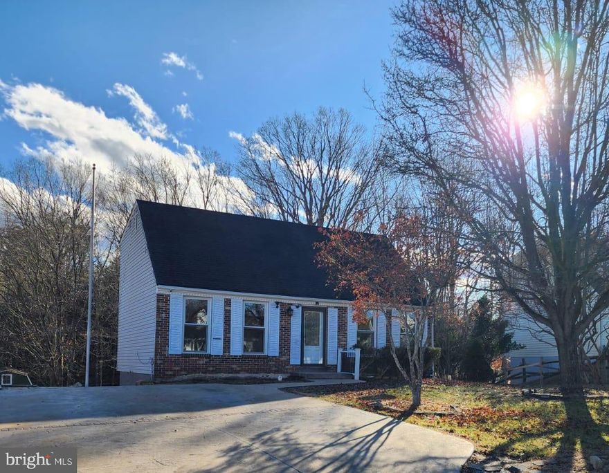 Newly Renovated & Move-In Ready! This beautifully updated 4-bedroom, 3-bathroom Cape Cod offers modern living across three fully finished levels. The home features a bright, open interior with fresh paint, brand-new flooring, and a contemporary kitchen designed for efficiency. Upstairs, spacious bedrooms are complemented by refreshed bathrooms, while the fully finished walk-out basement provides versatile extra living space and a third full bath. Situated on a private, fenced lot on a quiet cul-de-sac, the property boasts a large rear deck perfect for entertaining. Conveniently located near I-95, commuter routes, and local shopping, this home combines stylish upgrades with an ideal location. **Washer and Dryer in unit**