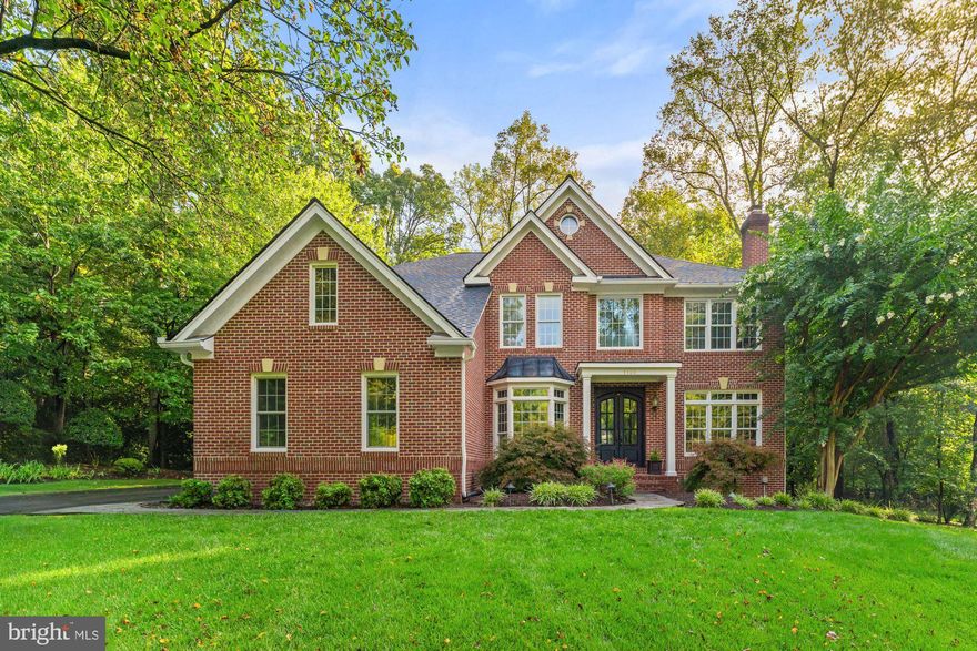 Exquisite craftsmanship both inside and out, in the peaceful cul-de-sac of West Oaks Estates. This move-in ready home has 5 bedrooms, 5.5 bathrooms, 7,074 finished square feet. It boasts an array of sleek finishes throughout this bright open floor plan that provides more than enough space for entertaining family and friends. Welcoming two-story foyer opens to two offices and dining room. Architectural details include chair railing, crown molding, and recessed lighting. At the heart of the home, the chef’s dream kitchen showcases an oversized center island with a Wolf range top, custom panel Thermador refrigerator, dual Thermador ovens, and two beverage refrigerators. Seamlessly connected to the breakfast room and family room with a fireplace, this space makes entertaining effortless. The soaring two-story sunroom/great room fills the home with natural light, creating a bright and inviting gathering place. Upper level luxurious owner's suite offers a private sitting area overlooking the great room, a spa-inspired bathroom with a soaking tub, spacious glass shower with dual shower heads, dual vanities, and a generous walk-in closet. Four additional bedrooms, three full baths including a Jack and Jill. Finished lower level features a large recreation room with stylish full bar, bonus room, utility room, full bathroom, and luxury steam sauna that provides a private retreat for relaxation and wellness right at home. Impressive two-story screened-in porch provides a serene retreat where you can enjoy tree lined views in every season, free from the elements. Spacious deck extends the living space and is ideal for summer barbecues, morning coffee, or hosting gatherings with family and friends. This 0.91 acre lot backs to trees for your own privacy with a well maintained landscaped backyard. A pathway from the backyard provides direct access to community walking trails, offering convenient connectivity for exercise, recreation, and daily enjoyment. A three car side loading garage and spacious driveway offer plenty of parking. Close to Navy Vale Fire House Park and easy access to Route West Ox Road & Fairfax County Parkway. Nearby Navy, Franklin and Oakton Pyramid.