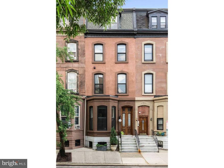 A Classic Rittenhouse Square Townhouse with Warm Sunlight, High Ceilings, and Bay Windows overlooking a Large, Beautiful, Private Garden. Enter into an Elegant Living Room with a Fireplace. Enjoy a Spacious Dining Room and a Large Eat-In Country Kitchen with Garden Views. The Second Floor is a Gracious Master Suite with Two Luxurious En Suite Baths and a Library Filled with Old World Details. The Third Floor has Three Spacious Bedrooms and a White Carrara Marble Bathroom. The Fourth Floor can be used as a Family Room or an Additional Bedroom with Stellar Skyline Views!