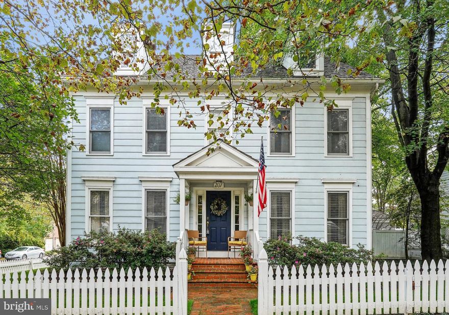 Rarely-available 5-bed, 4.5-bath single family home on a peaceful corner lot in the sought-after Kentlands community. Designed by esteemed builder, Mitchell and Best, this home features one of the largest parcels in the neighborhood and on the most beautiful, manicured street -- providing a front row seat from your very own porch to enjoy the annual 4th of July parade, the Kentlands 5K and the adorable trick-or-treaters. This home boasts hardwood floors, crown molding, and recessed lighting on the main level. The entertainer's kitchen offers beautiful off-white cabinets, granite countertops, stainless steel appliances, double wall oven, and a large eat-in breakfast area. The spacious and light-filled family room with cathedral ceiling, custom plantation shutters, views of charming garden and deck, built-in shelving, and a cozy gas fireplace is the ideal spot for a movie night in or watching the big game. The formal dining room, living room and conveniently-located powder room are perfect for entertaining guests or hosting memorable holiday dinners. You'll love the main level laundry room with extra storage for all of your organizing needs. Head upstairs when ready to relax in the luxurious owner's suite with two walk-in closets and en-suite bath with dual-sink vanity, soaking tub and large tiled stand-up shower. Two additional bedrooms and an upgraded full bath with tub/shower combo and wood-grain floor tile complete this first upper level. A bonus finished 3rd floor offers a 4th and 5th bedroom as well as an extra full bath, ideal for in-laws, au pair, in-home office, or art studio. Large lower level with recessed lighting throughout features versatility for an additional in-home office, kids' play space, rec room or space for long-term guests, with a full bath, built-in bookshelves, a second gas fireplace, and loads of extra storage. New carpet throughout all 5 bedrooms (2024) and the lower level! Step outside the family room and enjoy your own outdoor paradise. The picture-perfect private fenced yard is the ideal space for hosting a summer BBQ - featuring tree-lined views, large deck and gazebo with string lighting, and covered porch leading to the garage. The attached 2-car garage is an aspiring handyman or woodworker's dream, including two additional levels of custom raised storage, plus ample space for peg boards and workbenches for tools. Other recent improvements to this meticulously-maintained home include newer cedar-shake roof (2020), upper HVAC (2024), water heater (2018), and newer paint throughout (2019-2024). Enjoy the endless community amenities including outdoor pool, sports courts, walking paths, playgrounds, EV charging station, and more! Just a short walk to Whole Foods, Starbucks, restaurants, Cinepolis, Rachel Carson ES, Lakelands Park MS, Quince Orchard HS and more.