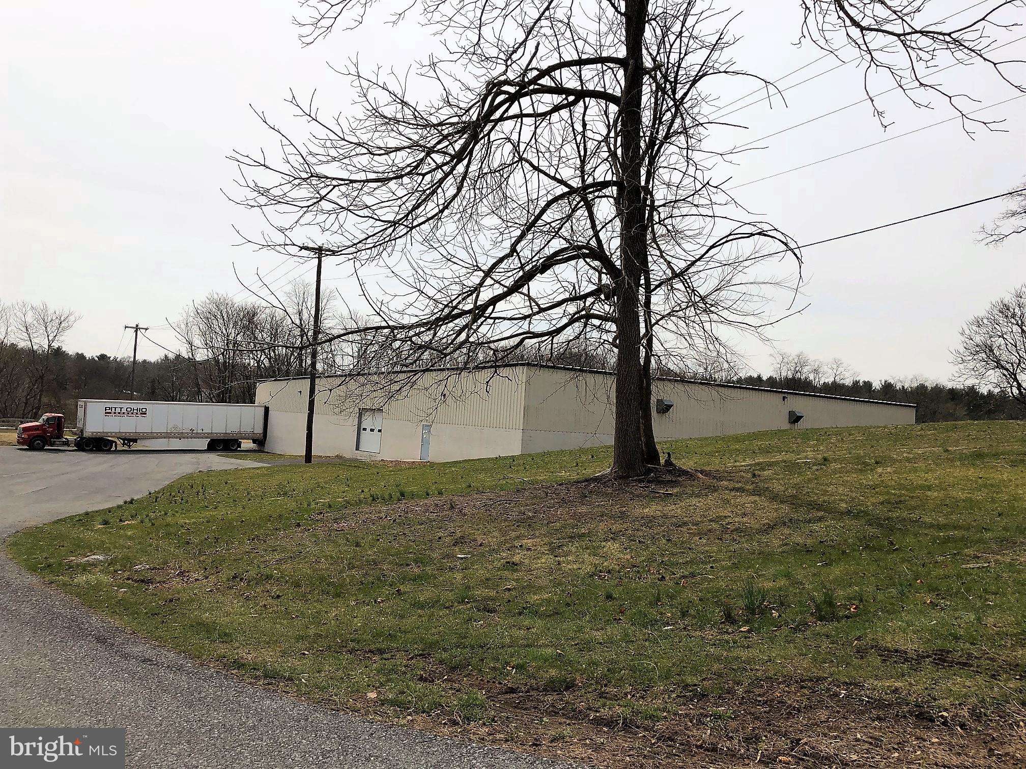 Nearly 140,000 square foot single story building located on 5.84 acres. Features 5 loading docks, sprinkler system, three phase electric service, public water/sewer and boiler heating system. Industrial Zoning could accommodate many uses. The site runs parallel to and abuts Newville's Public "Rails to Trails".