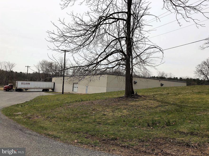 Nearly 140,000 square foot single story building located on 5.84 acres.  Features 5 loading docks, sprinkler system, three phase electric service, public water/sewer and boiler heating system.  Industrial Zoning could accommodate many uses.  The site runs parallel to and abuts Newville's Public "Rails to Trails".