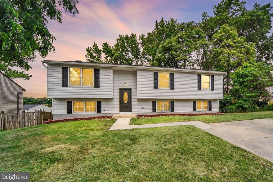 Welcome to 220 Sandhill Rd, a beautifully updated 5-bedroom, 3.5-bath home nestled in the desirable Goldentree community! This spacious split-level offers about 2,000 square feet of living space and is packed with modern upgrades—brand new roof, brand new HVAC system, and stylish finishes throughout.

Step into an open-concept main level featuring luxury vinyl plank flooring, a designer kitchen with white shaker cabinets, stainless steel appliances, quartz counters, and a custom tile backsplash. The upper level hosts a serene primary suite with a private en-suite bath, plus two additional bedrooms and a full hall bath.

The lower level offers a large family/rec room with a brick fireplace, two more bedrooms, another full bath, and a separate walk-out entrance—perfect for guests, in-laws, or a home office setup.

Enjoy summer evenings on the multi-tiered deck overlooking a private, fenced backyard with mature trees and a large shed for storage. There’s also a spacious patio below for even more entertaining options.

This move-in ready home checks all the boxes—don’t miss it!