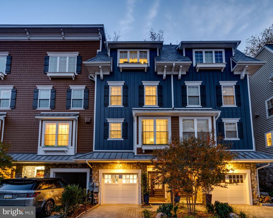 Presenting 4726 Cross Street, a custom-designed carriage house offering the most discerning buyer a glorious melding of traditional and modern, formal and casual, practical and luxurious. Developed and designed by one of Philadelphia’s leading sustainable and green building pioneers, Lehmann Homes, the Enclave at Sheldon Crossing remains a masterwork long after its completion. Every custom detail throughout this home has been a meticulous collaboration between the builder and the seller to create a timeless, one-of-a-kind design. Beginning at the entry, a flagstone driveway and walkway flanked in lush greenery leads to a grand entry with a wide foyer with an inlaid tile rug, a fitting and welcoming invitation. The entry level offers access to the oversized one car garage, a coat closet, utility room, and a bonus room with a full bath outfitted in lux ebony herringbone tile, providing privacy for guests as a 4th bedroom or an ideal space for a gym or den. Upstairs, the main living floor is truly a showpiece. A sun-drenched, completely open-concept floor plan boasts 12 feet of sliding doors inviting the outside in and removing visual barriers to allow for an expanded sense of space while providing a transparent shield that protects from weather. The deck is where you’ll enjoy coffee in the morning and cocktails in the evening in front of the fire pit. A privacy fence creates a true outdoor room and lush plantings, and twinkling lights provide the backdrop. The living room exceeds expectations with a gas fireplace with marble surround, custom built-ins, a wine fridge, crown molding, and dramatic coffered ceilings. The kitchen is the heart of every home and this centralized chef’s kitchen will not disappoint. The 10’ island with custom pendant lights and a striking wallpapered tray ceiling set the tone of this wonderful, whimsical space that anchors the floor. 42” Century-Gatehouse cabinets, a Wolf 6-burner gas stove, a built-in microwave, and a Subzero refrigerator are expected in a home of this caliber but a beautiful inlaid tile backsplash feature takes it to the next level. The adjacent dining room easily seats 10 and begs for a dinner party. Custom track art lighting, Sonos surround sound and a spectacular glass chandelier create the mood. A powder room and a large pantry round out the floor. Upstairs through dramatic double doors, find the sun-soaked primary suite, which boasts thoughtful details that have been blended effortlessly with modern comforts, creating a truly inspirational sanctuary. The spa-like bath offers double vanities with a marble backsplash, a free-standing soaking tub, and an oversized glass-enclosed shower with a rainfall showerhead. A separate water closet with a toilet allows for privacy. The primary bedroom merges classic charm with modern influences and the innovative design of a five-star hotel. With a diamond accent wall, recessed and track art lighting, and an enviable walk-in closet that raises the standard from an ordinary closet to a boutique-like space, this bedroom is everything you'd expect from a home of the highest distinction. The 4th floor features two additional sunny en-suite bedrooms with recessed lighting and plush luxury carpeting, as well as a comfortable office. The pièce de resistance of the home may not even be the home itself but rather the extraordinary roof deck. A truly magnificent cherry on top, the deck spans 16x49, the entire footprint of the home. Experience unobstructed views of the city’s skyline, and the hills of Manayunk. Sunsets are absolutely spectacular. A covered Trex deck with two rustic re-claimed barnwood feature walls, outdoor pergola curtains, and a full bar complete with a beverage fridge and a TV, allow for year-round enjoyment. Perfect for the buyer with discerning taste and an eco-conscious mindset, this gracious home truly checks all the boxes. *6 years remaining on tax abatement.