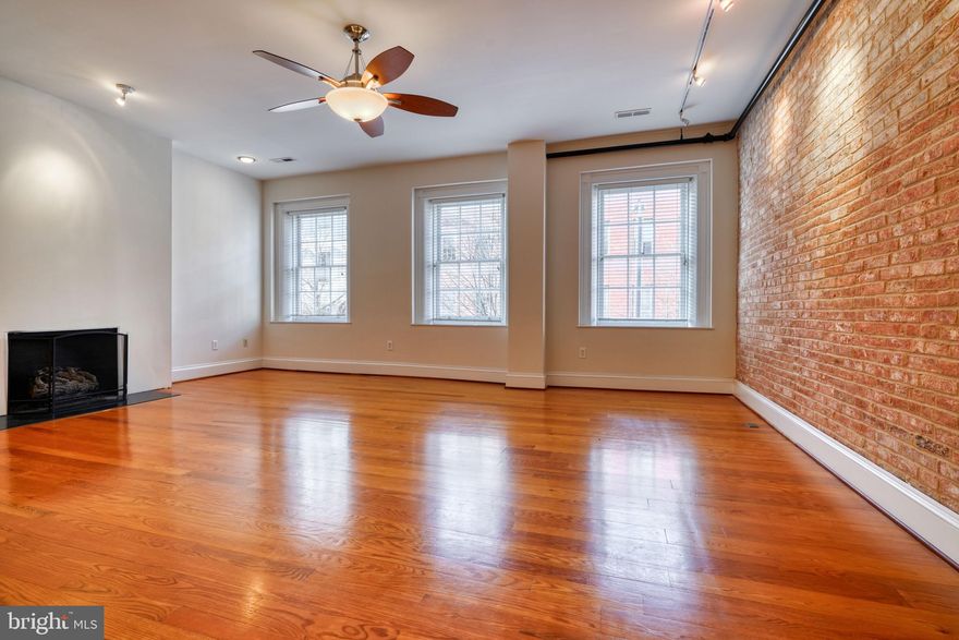 OPEN THIS SATURDAY AUG 16th 11AM - 1PM ! Great apartment available in Mount Vernon! This 2-bedroom, 2-bathroom WITH attached parking spot offers style, size, comfort AND a great location! Wood floors throughout, HUGE light filled living room with high ceilings and working fireplace, giant chefs kitchen with modern appliances, island, and ample storage. Plenty of room for an eat-in table and more. Both bedrooms offer tranquility, with the primary suite featuring an ensuite bathroom. Laundry is right in the unit! The building is privately managed and well cared for, and even has a shared lounge. Walk to everything! Situated in the historic Mount Vernon area, renowned for its cultural landmarks, vibrant community, and the added convenience of fabulous restaurants and shopping just a couple of blocks away, this apartment offers both historical charm and modern comfort. Don't miss the chance to experience the unique allure of Mount Vernon living. Schedule a viewing today and be awed by this beautiful space! One parking spot included with rent!