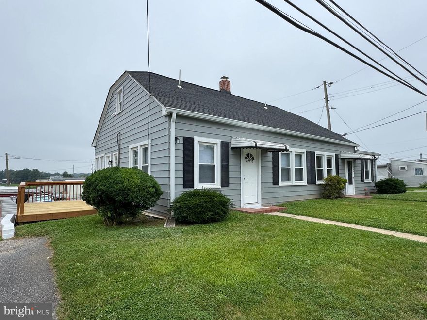 Charming single level living, 2BR,1 bath rancher duplex offers brand new carpet, freshly painted, new deck, ceiling fans, central air conditioning, new washer and dryer in unit, gas for cooking, and assigned parking. Great location with nearby sandymount elementary, sandymount park and Finksburg library. Available for immediate occupancy. Rent includes water, sewer, grass mowing,and trash removal . No smoking, no pets.  .$55 application per adult. Housing vouchers accepted.