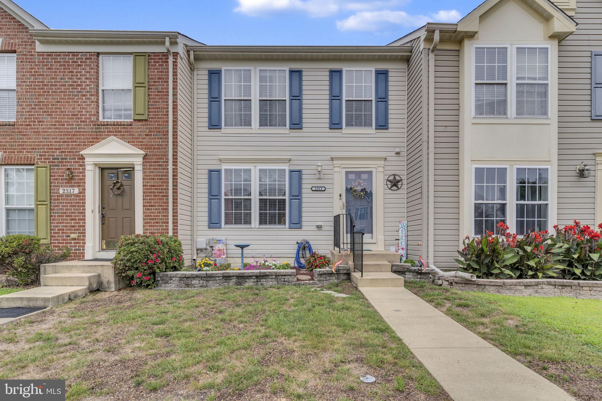Fantastic 3 level townhome with a rare three-level bump-out addition, located just minutes from the Chesapeake Bay, boardwalk, water park, restaurants, and more! This spacious and well-maintained home offers a blend of comfort, functionality, and location. The main level features a bright and open living room with dual windows for abundant natural light, ceiling fan with remote, convenient half bath, and coat closet. The kitchen is open and updated with stainless steel appliances. There's also a pantry. Off the kitchen is a versatile dining/family room area with three large windows featuring shutter blinds, a ceiling fan with remote, and a sliding glass door leading to the deck. A handy mobile pantry conveys. The expanded space also includes a built-in doggie door for pet-friendly living. Step out onto the brand new wooden deck overlooking the fenced backyard—ideal for outdoor enjoyment. The 6’ privacy fence was partially replaced just a few months ago. Upstairs offers two generously sized primary bedrooms, each with its own private bath. The owner's suite features vaulted ceilings, a walk-in closet, and a luxurious bath with jetted soaking tub, separate shower, double vanity, and recessed lighting. The second bedroom includes private access to a full bathroom with an additional hallway entrance and a ceiling fan.
The finished lower level offers a large open recreation room with high ceilings and carpeted flooring—perfect for entertaining or relaxing. There's a second half bath, a walk-in-sized storage closet (ideal for conversion to a 3rd bedroom), and a separate utility/storage area. Washer and dryer convey. HVAC system has also been recently replaced for added peace of mind. Good condition. Good location. GREAT PRICE!