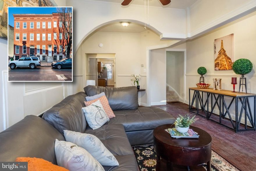 EXPANSIVE UPTON ROWHOME WITH OVER 1,800 SQ. FT. OF LIVING SPACE!  Spacious living room w/ tall ceilings and tons of natural light, separate dining area, Chef's kitchen w/ ss appliances & tile backsplash, main level half bath, 2nd level with 3 generously sized bedrooms and 1 full bath, 3rd level Primary suite with a full bath and additional bedroom, an unfinished basement that's perfect for storage, and a rear private patio!