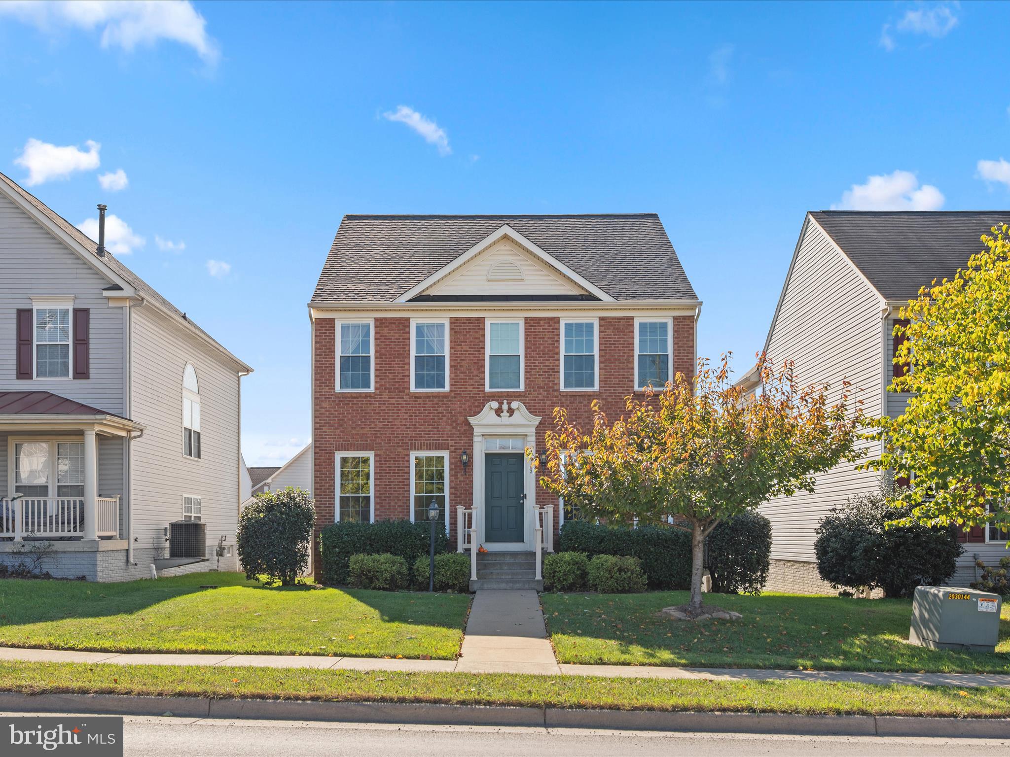 Welcome home to this warm and inviting brick beauty in the friendly Stephens Landing community. Thoughtfully maintained, this 3-bedroom, 3.5-bath home is filled with charm and comfort. The main floor welcomes you with gleaming hardwood floors, an abundance of natural light, and a cozy family room that’s perfect for relaxing. The galley-style kitchen with a bar countertop opens to the family room, making it easy to stay connected while cooking or entertaining, and the separate dining room is ideal for family meals or gatherings with friends. Upstairs, you’ll find a spacious primary suite featuring a soothing soaking tub and dual vanity sinks—your perfect retreat at the end of the day. The finished basement adds even more living space with LVP flooring, a large multi-use room, full bath, and laundry area with washer and dryer. Step out onto the deck to enjoy your morning coffee or an evening meal overlooking the charming backyard with its white picket fence. With sidewalks for evening strolls and a detached garage for added convenience, this home truly offers comfort, character, and that welcoming feel you’ve been looking for.