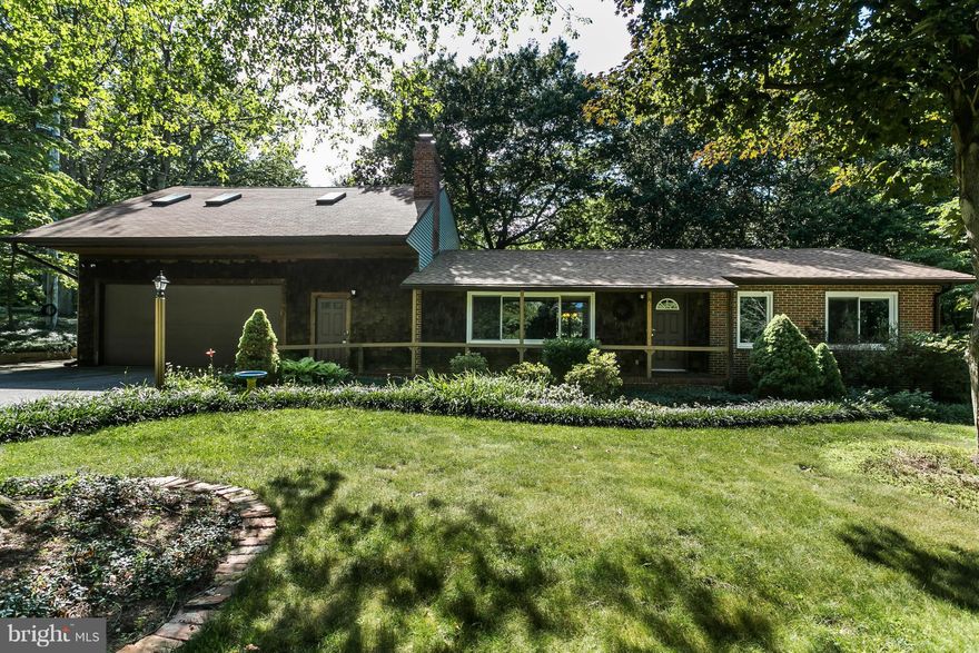 Gorgeous home w/beautiful sunroom addition on over 1+ acre! Privacy ++ Upgrades galore! New roof! New windows! Hdwds!Lg LR with stone-front f/p! Remodeled, gourmet KT w/new 42-in cabs, granite, updated appls, island, add'l wall oven, wine refrig! Sunrm w/cath ceilings! Huge mstr w/expanded closet & full bath! Upper level w/2 lg bdrms, bath & LR - perfect for inlaw ste! Fin bsmt! Immac in & out!