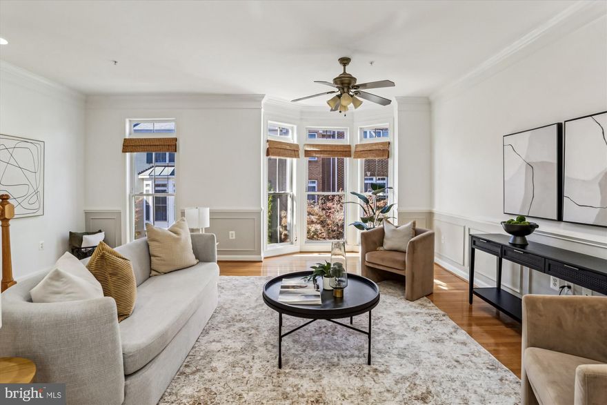 Welcome to 2309 Georgia Village Way, an open and spacious townhouse filled with natural light.  This home features wood floors, large windows, an eat-in kitchen with stainless steel appliances, and new carpet and interior paint.  The primary suite is luxurious with a substantial walk-in closet, dual vanities, a soaking tub and separate shower.  Two additional bedrooms and one full bath complete the upper level. Whether you're working remotely or commuting to work, this home has you covered. The lower level boasts a cozy den/office with a gas fireplace, perfect for working from home.  And conveniently located just 0.7 miles to the red-line metro, traveling to work and running errands is a breeze. Additionally, living here is easy.  Modern conveniences include a two-car garage, an upper-level laundry room, sidewalks in the neighborhood, and ample storage. This lovely home combines comfort, style, and location—an exceptional opportunity you won’t want to miss!