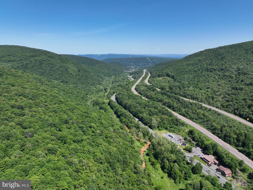 Mountain Maryland at its best!  207 acres in the heart of LaVale, endless possibilities, Route 40 Road, adjoins Wildlife Management areas for hunting along with many other uses,  one of few parcels available in this area, close to other retail, including high traffic route.