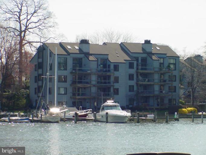 IT'S ALL ABOUT THE VIEW FOLKS! THIS GEM OFFERS A SPECTACULAR VIEW OF SPA CREEK, AND YOU CAN'T BEAT THE LOCATION! IMMACULATE 2 BR 2 BATH WF CONDO WITH UPGRADED BATHS & APPLIANCES. LOVELY LIVING ROOM W/ VAULTED CEILING, FP, & BUILT INS. ALL LIGHTING FIXTURES REPLACED. NEWER FURNACE & HOT WATER HEATER (2010), NEW BR WINDOWS & AWNING (2013). GATED WATERFRONT COMMUNITY W/ POOL, TENNIS, SLIPS, ETC!