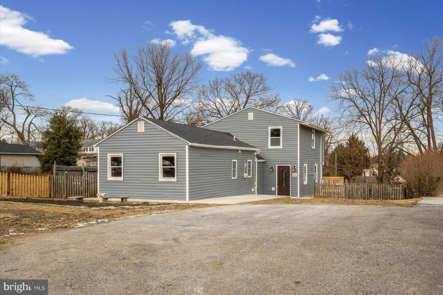 This charming contemporary home, fully renovated in 2025, offers a perfect blend of modern comfort and classic appeal. As you enter the front door, the open floor plan invites you to enjoy seamless living, with a spacious living room that flows effortlessly into the kitchen, featuring an island perfect for casual dining. The home boasts a variety of interior highlights, including recessed lighting, an entry-level bedroom, and luxurious bathrooms with walk-in showers. The kitchen is equipped with essential appliances, including a built-in microwave, gas range, and dishwasher, making meal prep a delight. All new appliances, quartz countertop, soft close cabinetry, architectural shingle roof, LVP and carpet flooring, dual zone HVAC. On one side of the kitchen is a Family room that leads to the Primary bedroom, en suite bathroom and a second bedroom with a full bathroom and a laundry area with washer and dryer. On the other side is a separate dining room that leads to a new spacious deck. Upper level has 3 bedrooms and one full bathroom. The home has a shared driveway. Set on a generous 0.31-acre lot, the property features a level, private rear fenced yard, ideal for outdoor gatherings or quiet moments of relaxation. Parking is a breeze with a driveway accommodating three vehicles. Located in a vibrant community, this home is surrounded by excellent local amenities. Enjoy nearby parks for leisurely strolls or picnics, and take advantage of the well-regarded schools that foster a strong sense of community. With convenient access to public services and major highways, this neighborhood is designed for comfort and convenience, making it a wonderful place to call home. Experience the warmth and charm of this inviting residence today!