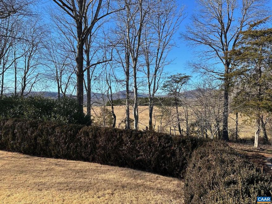 Local craftsman combined portions of three Virginia log cabins to create this hidden residence in the heart of Free Union.  Sited on 18 acres with pastoral and Blue Ridge views, this property is the perfect Albemarle escape.  Pool and pool house.