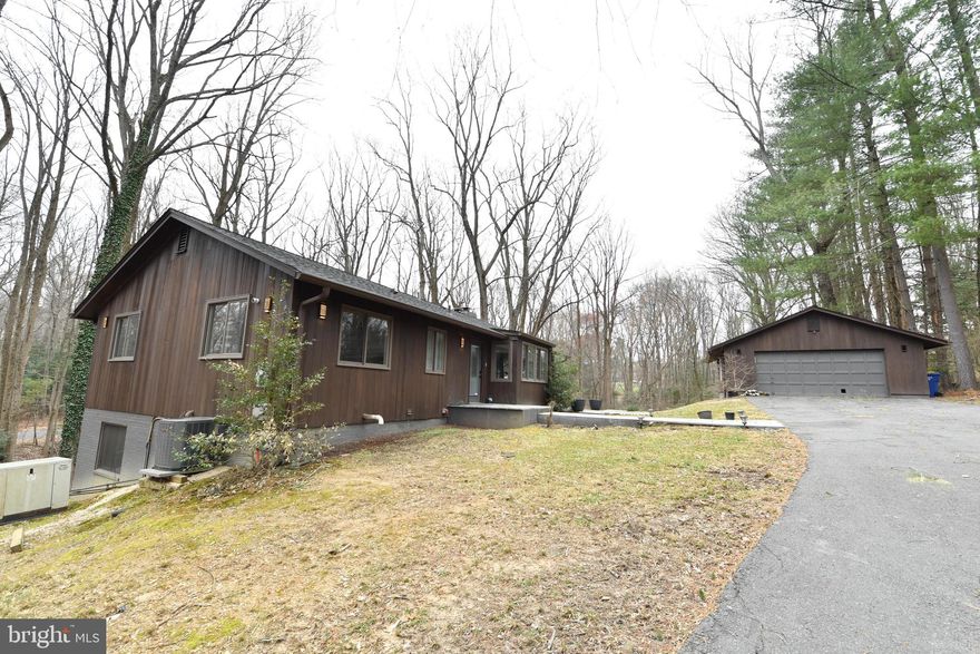 Renovated home sitting on a nearly 2-acre lot in an excellent location central to all of DMV, - yet with a tranquil/serene ambiance surrounded with trees and nature for surreal peace and privacy. This Rancher/Rambler has 4 and 3 bedrooms and a beautiful kitchen, all of which recently updated. Roof and HVAC have also been updated in the last 5 years.