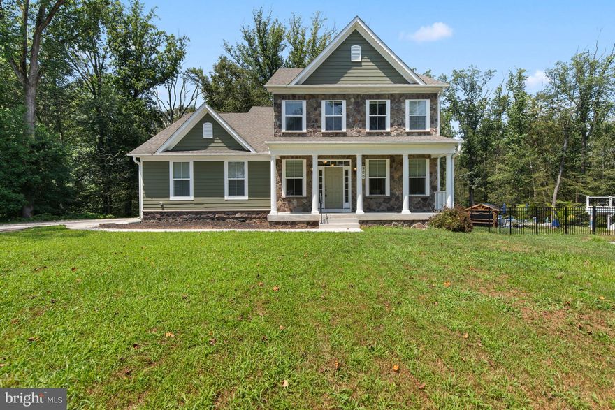 Be only the second owner of this custom-built 2017 home, thoughtfully upgraded and beautifully maintained, set on nearly an acre of private wooded serenity in sought-after Bel Air.

With striking stone accents, Hardie Plank siding, and a welcoming front porch, the exterior sets the tone for what’s inside; modern design, expanded living spaces, and smart upgrades throughout. The kitchen was intentionally widened during construction to create a true gathering space and features Corian countertops, stainless steel appliances, a generous island, walk-in pantry, and seamless flow into both the dining area and living room. Whether hosting holidays or casual weeknights, this layout delivers.

Real hardwood floors run throughout the main level, complemented by a dedicated sitting room or home office, perfect for remote work or quiet retreat. Natural light pours in, and every space feels open yet intentional.

Upstairs, you’ll find three spacious bedrooms and two beautifully finished full baths, along with the first of two laundry areas for everyday convenience.

The fully finished walkout lower level is where this home truly separates itself. Designed as a complete private apartment, it includes its own kitchen with sink, dishwasher, and cabinetry, a full bedroom, additional den or flex room, full bath, second laundry area, and a bright four-season room overlooking the backyard. Ideal for multigenerational living, extended guests, or long-term flexibility.

Outdoor living is just as impressive. A newly added composite deck extends your entertaining space and features a state-of-the-art covered swim spa - perfect for year-round relaxation or fitness, no matter the season. The nearly one-acre lot provides privacy, wooded views, and room to breathe.

Additional upgrades include new carpet, tankless water heater, EV charging ports, and an expanded driveway with turn-around space for ease and practicality.

Quality construction, intentional upgrades, flexible living space, and modern systems, this is the kind of home that rarely becomes available.