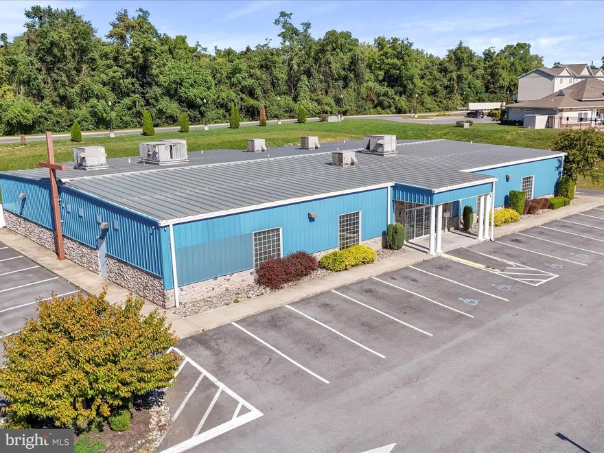 Prime Commercial Building over 10,000 Square Feet and 1.85 acres! Incredible investment opportunity with this expansive commercial property, ideally located in a thriving location with easy access directly off I-81. This building is currently used as a church but designed to accommodate a diverse range of usage that can cater to a variety of enterprises.  The mixed used possibilities opens future business opportunities such as retail, office space, hair salon, day care facility, or warehouse, etc. The possibilities are endless! The lot offers ample parking and easy access ensuring convenience for future customers and employees. Investing in this building not only offers a physical space, but also a chance to be at the forefront of commercial development in the area. Schedule your time to see what this building has to offer and make it yours.