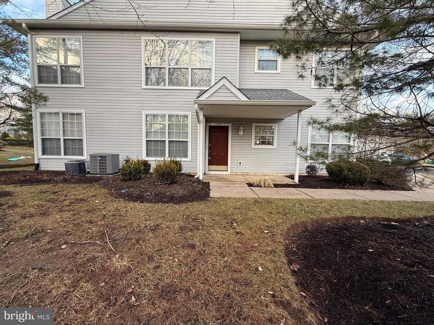 Welcome home to 1502 Waterford Rd. This is a highly sought after first floor unit in the desirable Brookstone development. This unit comes equipped with a driveway and garage, perfect to keep your car or additional storage space. The flooring in the living room and bedrooms has been redone with luxury vinyl planking. Walk directly into the home from the attached garage and down the hallway to an open concept living room. There is a  fireplace in the living room. Directly off the living room you have access to your private patio, which is perfect for enjoying a morning cup of coffee. Off the living room is your freshly painted eat-in kitchen equipped with an electric stove, built in microwave, and dishwasher. Continue down the hall from the living room to 2 spacious bedrooms and bathrooms. The primary bedroom offers an attached ensuite bathroom and 2 large closets. The second full bathroom is located directly across from the second large bedroom. Community amenities offer a pool, tennis court, and playgrounds!  Located in Pennsbury School District too! Commuting and traveling will be a breeze with easy access to 95. Don't miss out; schedule your appointment today!