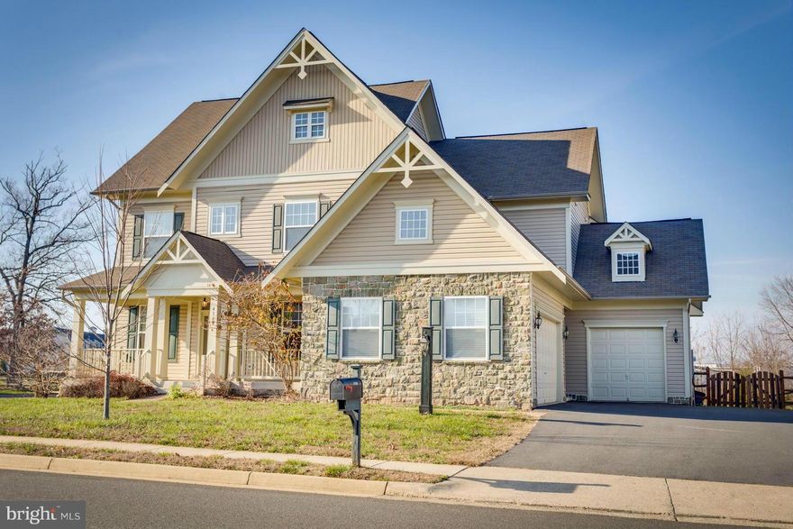 Modern Luxuries paired with Historic Charming Vint Hill Community* Gorgeous 3,800+sf* Open Floor Plan* Gourmet Kitchen opens to Family Rm w/ Breathtaking Stone Fireplace* Oversized Master Bedrm with Sitting Rm, Spa-Inspired Master Bath & Large WI Closet* 3 Car Garage* Fenced Rear Yard* Walk to the Community Amenities- Pools, Ball Parks, Movie Theater, Cafe, Brewery, Winery, Marketplace & Dog Park