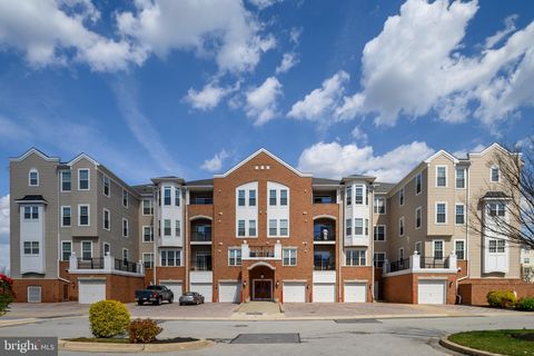 Photo of 8605 Wandering Fox Trl #203, ODENTON, MD 21113 (MLS # MDAA2140528)