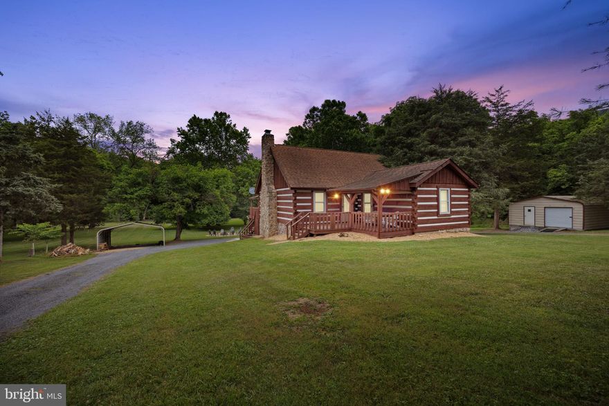 Discover this one-of-a-kind log cabin retreat nestled right on the Shenandoah River and surrounded by majestic mountains. With five bedrooms, apark-like backyard, and easy access to a calm stretch of water, this property offers the perfect blend of relaxation and adventure. Located just 1.5 hours from DC, andminutes from Seven Bends State Park an the quaint dining options of Woodstock, the cabin is both convenient yet private. Inside, you'll find authentic log construction--both interior and exterior creating a warm rustic atmosphere. A stone woodburning fireplace anchors the living area, adding comfort and charm during every season.The main level features primary bedroom plus lofted bunk room with two full bathrooms off the living area. The lower level offers three additional bedrooms, a fullbathroom, a second living space and walk-out access to the backyard. Step outside to enjoy a concrete patio, hot tub, and plentiful parking, perfect for entertaining orunwinding after a day on the river. Currently operating as a successful short term rental for several years, this property is equally suited as a private getaway, familyretreat, or income producing investment.
