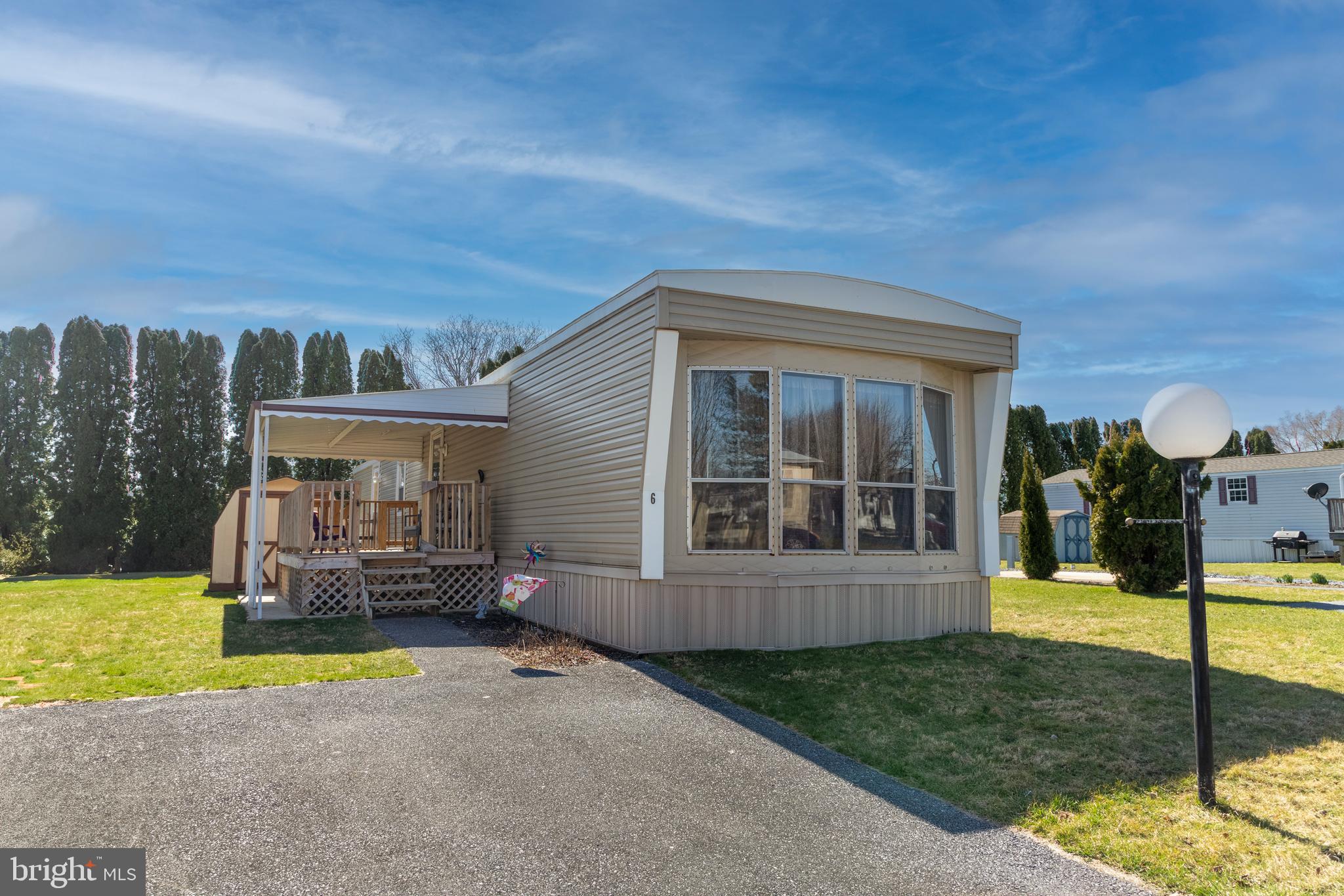 Welcome to 6 Northcrest Acres, a charming manufactured home nestled in the heart of Lebanon, PA. With 2 bedrooms, 1 bathroom, 980 square feet of living space, and lots of modern updates, it offers comfort and convenience in a great location.
In December of 2019, extensive renovations transformed the home, including the replacement of drywall, flooring, skirting, and siding, as well as the addition of a covered deck. Notable updates continue with the replacement of the furnace, converted to natural gas in 2021, and a new AC unit in the same year. In 2023, the roof was replaced, offering peace of mind and added durability for years to come. Additionally, a new vapor barrier was added in 2021.
Don't miss your chance to make this well-maintained home your own. Scheduling your showing today!