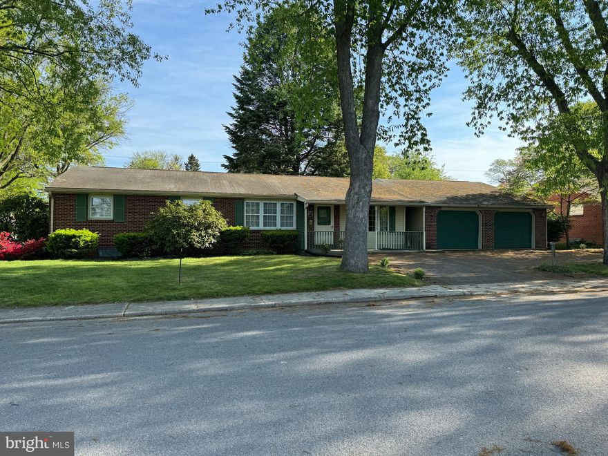 NICE BRICK RANCHER ON A CORNER LOT! This brick home is conveniently located on a corner lot in the Shippensburg borough, and walking distance to Nancy Grayson Elementary School! The home features 3 bedrooms, 2 full baths, kitchen, dining room, living room, family room, screened in sunroom, laundry room, finished basement, and a 2-car garage! The finished basement was just renovated 2 years ago! Much of the main floor is hardwood floors! Come and make this your home!  This property will be offered at auction on Tuesday, May 7, 2024  @ 3:00PM.