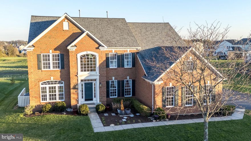 Welcome to this stunning brick home in the highly sought-after Lederach Golf Club community, offering breathtaking views of the 12th green and fairway. This beautifully customized Highgrove model combines elegance, space, and everyday comfort.
From the moment you step inside, you’re greeted by soaring ceilings and a dramatic dual staircase. The formal dining room with classic wainscoting and the inviting living room create the perfect setting for entertaining. Rich oak hardwood floors, crown molding, and an open-concept layout flow throughout the main level.
The impressive two-story family room features a full stone gas fireplace and oversized windows that flood the space with natural light. The gourmet kitchen is designed for both cooking and gathering, complete with granite countertops, a large island with seating, stainless steel appliances, gas cooktop, dual wall ovens, 42" cherry cabinets, and both a walk-in pantry and butler’s pantry.
Enjoy peaceful mornings in the sun-filled morning room with floor-to-ceiling windows overlooking the golf course, or step outside onto the updated deck (with retractable awning) and take in the serene views—your own private retreat.
The main level also includes a spacious home office, powder room, and convenient laundry room with garage access.
Upstairs, the luxurious primary suite offers a tray ceiling, crown molding, dual walk-in closets, and a spa-like bath with soaking tub, separate shower, dual vanities, and private water closet. Three additional generously sized bedrooms and two full baths complete the second floor.
The finished basement provides incredible additional living space—perfect for entertaining, a media room, home gym, or playroom—along with a half bath and abundant storage.  
Additional highlights of this home  include a new roof  in 2021 and new HVAC in 2024, central vacuum system, whole-house speakers, 9-foot ceilings, ceiling fans throughout,  an expanded driveway for up to 6 cars, electric dog fence (front and back), and a beautifully maintained exterior with upgraded brick and quoin corners.
No HOA and meticulously maintained—this home is truly move-in ready. Ideally located near charming Skippack Village, Lederach Golf Club, and easy access to the PA Turnpike.