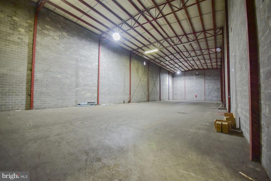 We are pleased to offer a spacious warehouse for rent, perfectly suited for heavy industrial storage needs. This warehouse features a convenient loading dock, making it easy to handle and transport goods. With a vast area of 7500 square feet, you'll have ample space to accommodate your storage requirements.

The warehouse boasts impressive 32-foot high ceilings, providing abundant vertical storage capacity. This generous height allows you to maximize your storage capacity and efficiently stack goods or equipment.

Recently upgraded with new LED lighting, the warehouse is well-lit, ensuring excellent visibility throughout the space. This feature not only enhances safety but also creates a productive and well-illuminated working environment.

Additionally, the warehouse is equipped with a brand new roll-up door, providing easy access for loading and unloading operations. The roll-up door ensures smooth and efficient movement of goods, saving you time and effort.

As a special offer, we are providing the first 60 days of rent-free occupancy to tenants who sign a 3-year lease. This allows you to settle in and start your operations without the burden of immediate rental expenses.

Don't miss out on this opportunity to secure a high-quality warehouse space perfectly suited for heavy industrial storage. Contact us today to schedule a viewing or to inquire further about the lease terms and conditions.

Note: Images and additional details are available upon request.

We look forward to hearing from you soon!