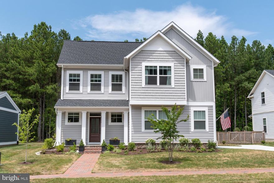 Rare opportunity to own this like new, 2023 constructed, Taylor II Model in highly sought-after community of Easton Village.  This 4 bedroom, 3.5 bathroom home features an open concept floor plan with lots of natural light, stunning gourmet kitchen equipped with Stainless Steel Appliances/hood, custom backsplash, gas cooking, and upgraded counters.  Enjoy the main level en suite primary bedroom with walk in closet and spacious bathroom featuring birch cabinetry.  The second floor includes 3 additional bedrooms and 2 full bathrooms.  Outside you will find a well-manicured lawn with lush landscaping and a fenced in yard that backs up to the woods creating a private setting on nearly ¼ acre.  The 19’7’’ X 14’ 5’’ Patio is perfect for relaxing and entertaining your guests.  Side entry 2 car garage.  Conveniently located just minutes from downtown Easton and all of its amenities, providing easy access to dining, shopping, and recreational activities.   Community amenities such as a community clubhouse & pool, kayak racks, small beach, bocce court, walking trails, as well as boat slips and water access to the scenic Tred Avon River provide additional enjoyment close to home.