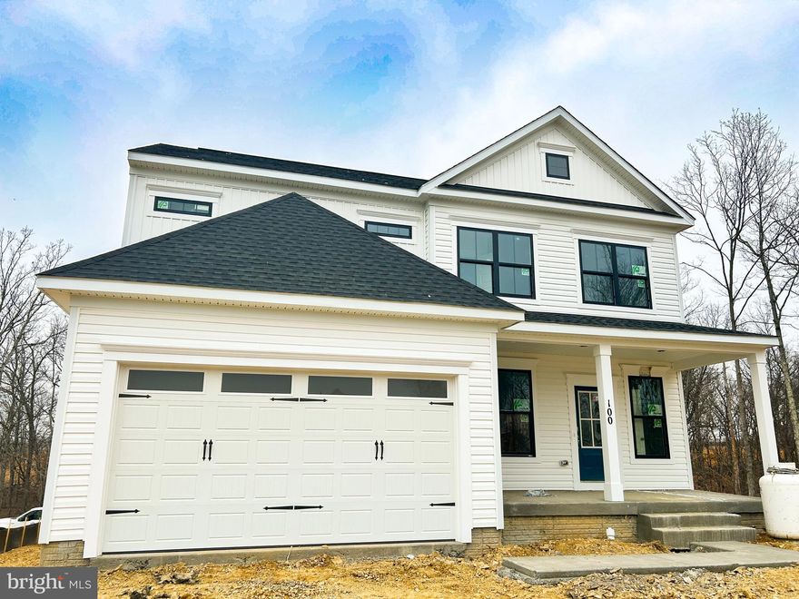 Located on one of the best homesites in Snowden Bridge, an amenity filled community near Winchester! Fantastic corner homesite on a cul-de-sac, backing and siding to tree conservation areas! 
This home is nearly finished construction and has it all!  Stunning full front porch welcomes you home.  The kitchen is well appointed with stone grey cabinets, quartz counters, farmhouse sink, and a gourmet stainless steel appliance package! Off of the kitchen, enjoy the sunroom which leads to the rear screened porch where you can really enjoy the serenity of this homesite as it overlooks all of the trees and conservation area.  Main level is stunning with top tier luxury vinyl plank throughout. 
Oak stairs lead to the 2nd level where you find the Primary Bedroom with a  Deluxe Primary Bath which includes the Soaking Tub, 
Walk Out lower level includes a finished Rec Room,  full bath and 4th bedroom. 
Snowden Bridge is a premier master-planned community with exceptional amenities including a swimming pool, pirate water park, indoor sportsplex, community park, fenced in dog park, and playground. In addition, there is a bike track, walking trails, and a picnic pavilion. You won’t have to leave to have fun, but when you do you’re just minutes from all the convenience and entertainment around Winchester. Closing Cost Assistance Available.