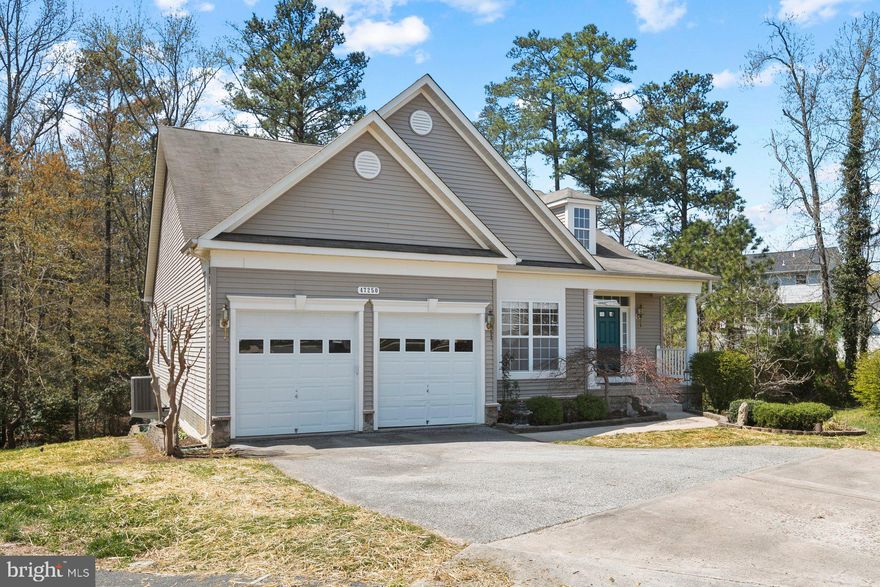 Adorable 3 bedroom on a partially finished basement in popular Greenbrier subdivision!  This cozy home backs to woods and features a large deck for outdoor entertaining.  Beautiful bamboo flooring on main level, trayed ceilings in dining room and master bath and open concept kitchen/dining/living room are just a few of many awesome features in this home!  Functional main level floor plan and a cozy front porch are also a plus.  Walk out basement has almost finished theater room and floor to ceiling windows to capture the natural light.  This move-in ready home is freshly painted throughout and ready for your family.  Book your showing today!