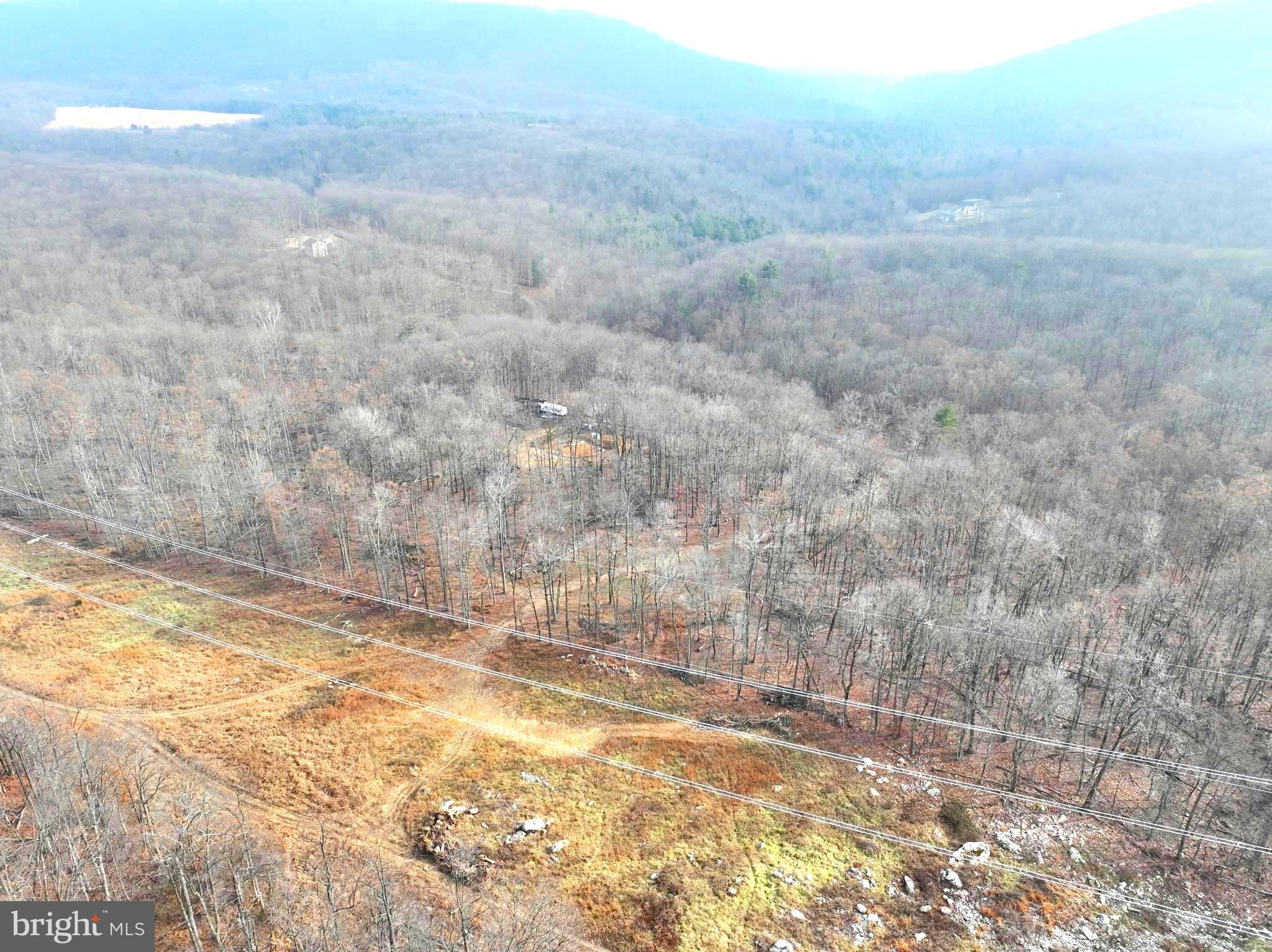 WHISPERING PINES - Land