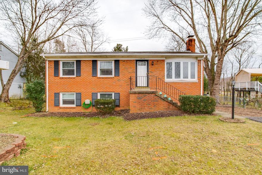 Welcome to this lovely home where you can put your own finishing touches. Lots of natural light fills the living space and the kitchen has stainless steel appliances. The dining room has sliding doors to the deck that overlooks the east facing back yard and the green spaces beyond the property line. There are 2 bedrooms on the main level with a full bathroom and a half bathroom.  The basement features 2 more bedrooms and a potential full bathroom,  laundry and storage, spacious family/rec room with fireplace and walkout access to the fully fenced in back yard.  Convenient to schools, shopping, restaurants and commuting routes.