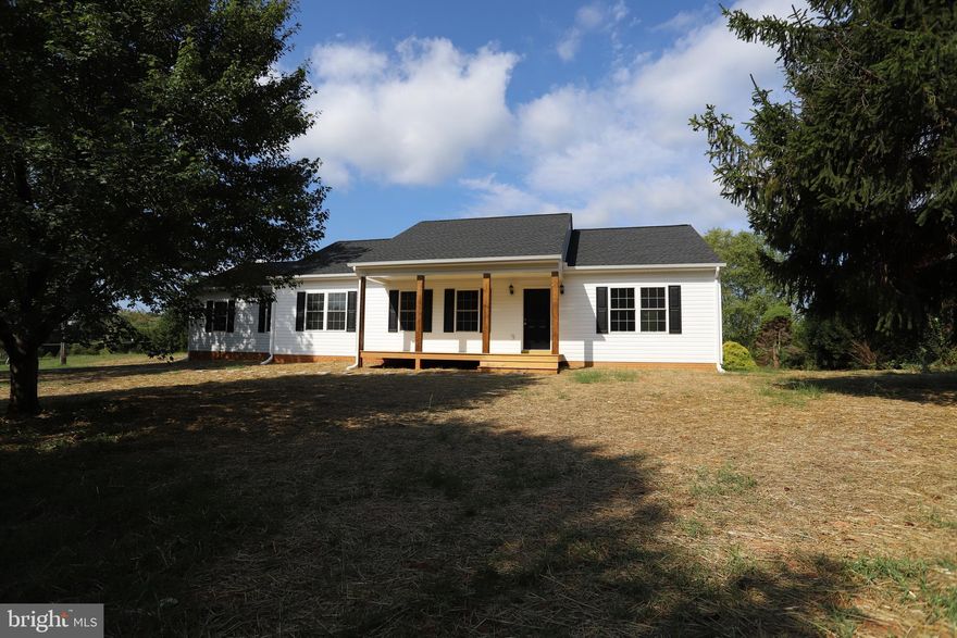 Fantastic New Construction in Northern Culpeper County! Open, bright and airy 3 bed/2 bath rambler boasts approximately 1,600 sq/ft of beautiful well-built space. LVP throughout the entire living space, upgraded kitchen with island, granite counters and stainless appliance package, split bedroom floorplan, vaulted ceiling, covered front porch with stained posts, primary suite with separate shower and freestanding tub, rear deck already installed, oversized 2 car side-load garage and much much more!  The awesome new built is nestled on an open 1.5 acre lot with mature trees and seasonal mountain views! Please note exterior photos are of actual home, while interior photos are of the same model, but a different build.  Finishing touches are being completed now and expected launch date is Monday, August 28th!