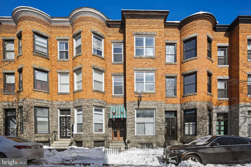 Welcome to 724 Reservoir Street, a remarkable historic residence offering five bedrooms and three-and-a-half bathrooms across four expansive levels. Rich with architectural character, this home showcases timeless details including stained glass doors, solid wood craftsmanship, exposed brick accents, and multiple fireplaces throughout.

Soaring ceilings and abundant natural light highlight the home’s generous scale and thoughtful layout. The main level features a spacious living area with elegant arched doorways that flow seamlessly into the sitting room and dining area—an ideal setting for entertaining and gathering with guests. The kitchen completes the first floor, featuring exposed brick that further enhances the home’s historic charm.

The second floor showcases the first of many expansive bedrooms, continuing the home’s signature high ceilings and offering a walk-in closet. Across the hall, a study with built-in bookshelves leads to a full bathroom and the second bedroom on this level, creating a functional and versatile layout.

The third floor offers two additional spacious bedrooms, along with a large family room filled with natural light from oversized windows and skylights positioned at the top of the grand staircase. A full bathroom on this level adds convenience and comfort.

The lower level completes the home with a fifth bedroom and an additional full bathroom, providing a private retreat ideal for guests or extended living. Outdoor living includes a private deck—an especially sought-after feature in an urban setting—and a fully fenced backyard perfect for relaxing or entertaining.

This piece of history is for the taking and has the potential to be a warm and welcoming home that fits your lifestyle. Don't miss out on your chance to call 724 Reservoir Street yours!