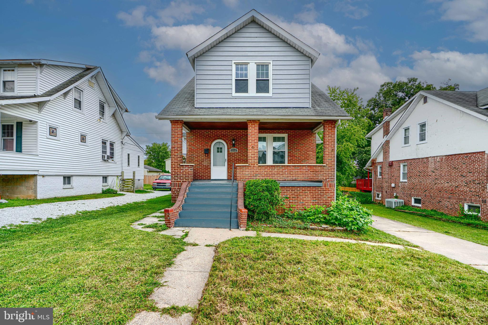 Price Just Reduced PLUS Ground Rent has been Redeemed!!! Looking for a large home with 3 levels of finished living space?  Look no further than 2715 Bayonne Avenue.  This home boasts tons of room to roam for a large family or need for multigenerational use.  The main level features a spacious living room, bedroom with full bath, re-designed kitchen with eat-in breakfast nook and 2 food prep areas plus a separate dining room.  There are 3 bedrooms on the upper level with ceiling fans with lights and a walk-in closet. This home features new vinyl flooring throughout and 2 recently remodeled full baths with showers.  The basement is fully finished with a powder room, laundry room and 4 separate rooms for your choice of use. The roof, windows, HVAC, electrical and plumbing have been upgraded in 2011.  The hot water heater was replaced in 2010.  Both the interior of the home and the exterior siding has recently been freshly painted.  Enjoy a large carport at the back of the property to provide private parking for your vehicles.  Come ‘Home Sweet Home’ and move right in for the upcoming holidays to enjoy wonderful family gatherings.  Note: Front porch and steps to be painted.
