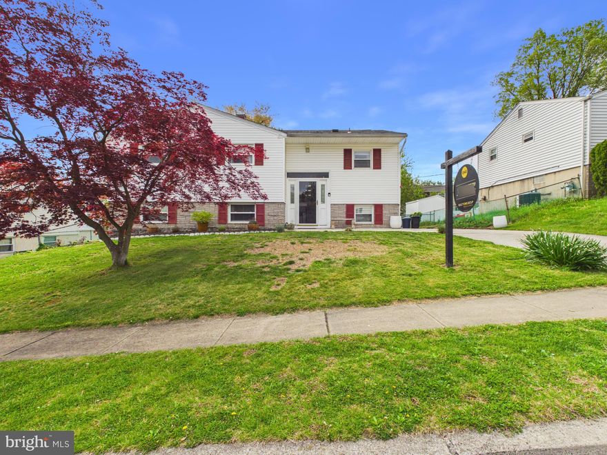 Great opportunity to own a spacious 4-bedroom, 2-full-bath split-level home offering comfort, flexibility, and room to grow. This home is ideal for buyers looking for a layout that can support multi-generational living, an in-law suite, au pair setup, guest quarters, or separate upper/lower-level living options.

The main level features beautiful wood floors, a bright and inviting living space, and a functional layout designed for everyday living. With two full kitchens, this home offers excellent flexibility for extended family, guests, or buyers who desire added convenience and separation of space. The lower level provides additional living areas that could easily serve as a private suite, recreation space, or independent living area.

Enjoy the comfort of a sunroom overlooking the rear yard, a spacious rear porch/deck perfect for relaxing or entertaining, and a well-manicured lawn that adds to the home’s curb appeal. The spacious fenced rear yard offers plenty of room for gatherings, gardening, pets, play, or simply enjoying your own private outdoor retreat.

Additional features include off-street parking, generous living space, two full bathrooms, and a versatile layout that gives the next owner plenty of options. Conveniently located near shopping, dining, commuter routes, schools, parks, and everyday amenities, this home offers the space, function, and flexibility today’s buyers are looking for.