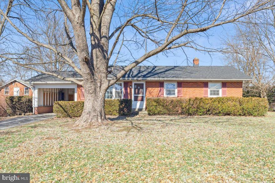 OFFER DEADLINE SUNDAY 2/23 @ 2PM. Do not miss this rare opportunity to own a home close to everything without paying city taxes. This home has a large backyard and features a carport for convenient access into your future home. The kitchen allows plenty of room to entertain. Each bedroom is spacious with plenty of closet space. The original hardwood flooring is shown throughout the home, The basement is large and ready for your finishing touches, a workshop, game room, storage? Newer roof. The possibilities are endless with this home to make your vision come to life! Home is being sold strictly as- is.