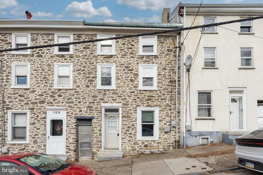 Discover the Charm of 158 Roxborough Avenue in Manayunk!

Step into this inviting stone-faced beauty, perfectly blending modern upgrades with timeless character. Whether you're an owner-occupant, investor, or both, this home has something special to offer.

The newly updated kitchen is a showstopper, featuring stainless steel appliances, a subway tile backsplash, and sleek quartz countertops. Outside, enjoy a generously sized yard and a private, well-maintained back patio—perfect for entertaining or relaxing.

On the main floor, you'll find a spacious living room, a dedicated dining area, the stunning kitchen, a convenient laundry space, and a full bathroom with easy access to your outdoor oasis. Upstairs, the upper levels offer four bright, sun-filled bedrooms, ample closet space, and an additional full bathroom.
Situated just one block from the heart of Main Street, you'll love the convenience of Pretzel Park (and its dog park!), local restaurants, shopping, and public transportation options like the train and bus. With its unbeatable location, thoughtful updates, and endless charm, this home is not only move-in ready but also an exceptional investment opportunity.

Don't wait—schedule your showing today! Reach out to the listing agent for more details.