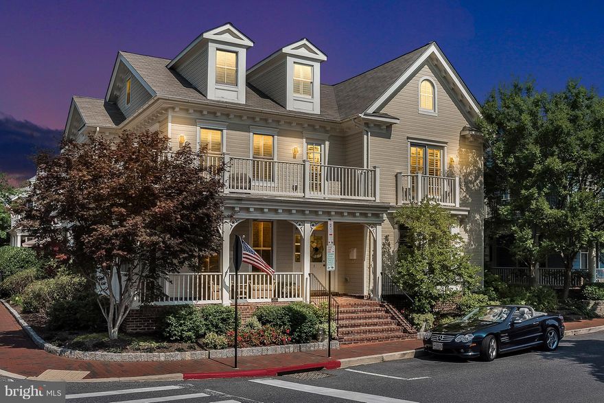 Repositioned Price Point.....Walk to town, jump in your dinghy, enjoy the water views of Spa Creek and the green space of Duck Park.  Check out the front porch of this refined, beautiful Annapolis home where you can enjoy water views, visit with neighbors or just relax.  This home features unparalleled finishes, expert workmanship, quality and details....NYC sophisticated combined with the Annapolis lifestyle is a winning combination.  The back patio is lovely with mature hollies providing privacy for  entertaining  guests or enjoying a morning coffee or afternoon cocktail and there is a private bedroom suite above the garage. Custom woodwork throughout, crafted in New York, Jerusalem Limestone square tile floors with various inlay materials, including honey onyx. Fluted millwork door frames and columns, red oak wide plank hardwood floors....some with parquet border surround,. The second floor master suite includes a sitting area and his/her private bathrooms with two very large walk-in closets and a waterside deck.  The guest bedroom on the same level has an ensuite bathroom, walk in closet and faces the park with water views. The third floor is flex space with 1-2 bedrooms and a full bathroom. This is also great space for kids to play. Tie up your boat at the public dock, so close to town you won't think twice about popping out for a cup of coffee.... enjoy the Annapolis lifestyle in all ways possible from this outstanding home.