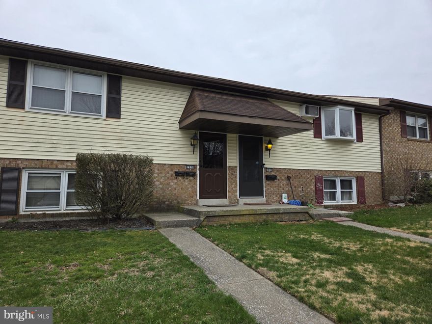 This home is amazing, it has 2 full apartments. What an amazing opportunity for you to not only own one but two apartments. Each one comes with 2 parking spaces.  Live in one apartment and rent out the other or rent out both. The seller is only the second owner, the first owner had this home built for herself to live in one apartment and her son to live in the other. Today’s seller has been renting it out since 1995, one tenant has been there for a very long time. Both apartments have the same floorplan, the only difference is that the upstairs apartment has a deck and the lower level one is a walk out to a patio. When you open the main door, you are looking at a staircase to one apartment upstairs of 672 square feet and the other one downstairs of 662 square feet. When you enter the apartments,  you find yourself in the living room, the bedroom is to your right and the bathroom is off the bedroom as is the deck or the patio. To the direct right is the dining room or office, both tenants are using that space as office and the kitchen is off this area. The kitchen is a full galley kitchen, and both apartments have their own washer and dryer. The tenants are on month-to-month leases.