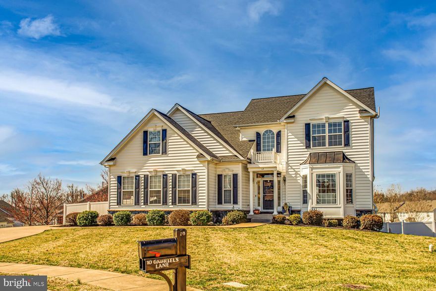 DEADLINE FOR ALL OFFERS: 
MONDAY, 3/14 @ 5PM
CONTACT Branden Beasley with questions!!

This home has been immaculately cared for over the years, and features many recent upgrades, and boasts almost 5000 livable, comfortable, functional, and usable square footage! It has an estately black and white colonial facade on a hill at the end of the cul-de-sac. It also features a side-loading oversized 2 car garage, with a large driveway. The large corner lot contains a completely fenced in rear yard with white vinyl privacy fencing panels. The main level master suite is a huge selling point, along with the sunny dining space, vaulted ceilings, open concepts, modern finishes, fireplace with floor to ceiling stone surround, hardwood floors throughout the main level, a clever mudroom, a built-in irrigation sprinkler system, and a foyer grand staircase that leads to a catwalk overlooking the family room. Updates since the last purchaser are a 2-zone NEW HVAC system, NEW ROOF, NEW vinyl privacy full rear fencing, some new landscaping to include fruit bearing trees, and an additional 1600+ SQFT of space in the walkout basement. The basement was recently completed and fully inspected/permitted by Stafford County. It features a huge quartz bar space, with wet-bar sink, refrigerator, and room for 8 bar stools. The basement also features open spaces for entertainment, a tile foyer leading to access for the rear yard, a large legal bedroom, a full bathroom, and a custom doggy-bath/shower!