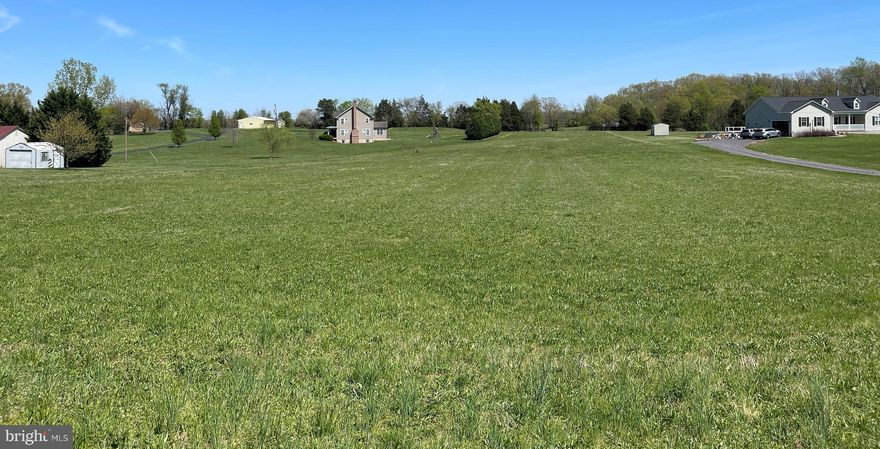 Looking for a 3.26 acre building lot in Culpeper County?  Gotcha covered with this open, level lot that backs to farmland.  Small cluster of newer homes previously built with this being the last lot.  Great commuter location with quick and easy on/off highway access. Rumor has it Verizon is installing internet via a contract with Culpeper County.   Cellular service is strong here as well.  This information should be verified.  Happy to provide Builder contacts upon request.