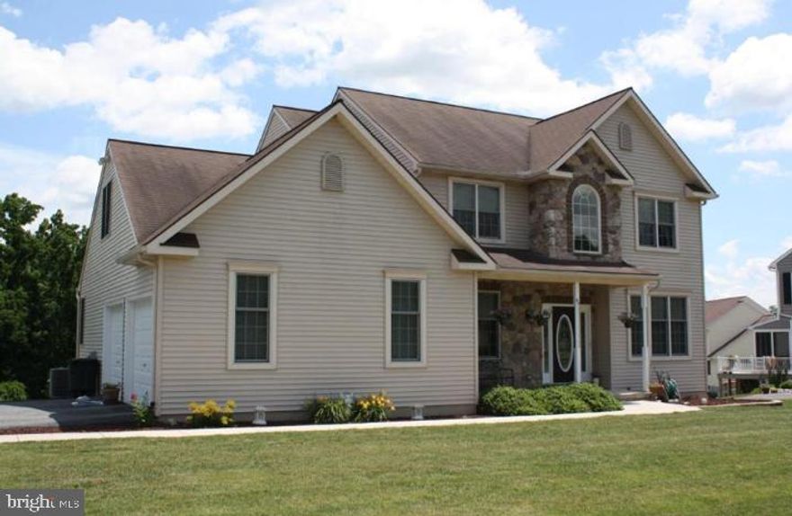 This lovely 2-story offers 5 bedrooms, 3 full baths, 2-car garage, finished (daylight) lower level w/ roughed-in bath, bamboo flooring throughout the first and second floor, natural gas heating, open kitchen w/ granite tops & stainless appliances, formal dining room with tray ceiling, 1st-floor study, family room fireplace, refreshing pool w/composite decking and lower patio, large open yard, two-story foyer, and convenient to town & rte 283.