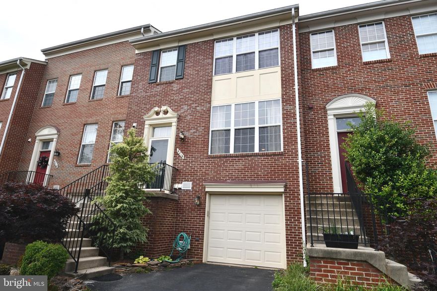 Wonderful brick townhome w/ garage in amenity rich Kingstowne! Main level features combination living room and dining room with beautiful wood floors. Spacious kitchen has space for table. A NEW DECK IS BEING BUILT OFF OF KITCHEN! Primary bedroom has huge walk-in closet and ensuite bathroom with large soaking tub, separate shower and dual vanity. Lower level rec room has gas fireplace and full bathroom. Less than 2 miles from the Franconia/Springfield Metro, easy access to I-495, 95, 395. Close to shopping restaurants, plus all the amenities of Kingstowne! Pets accepted on a case by case basis.  $25 set up/technology fee due at move-in (one-time fee).